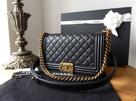 chanel le boy caviar gold|The Ultimate Guide to the Chanel Boy Bag .